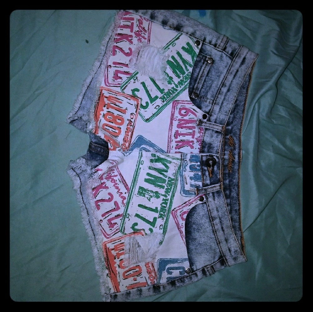 License plate cutoff shorts